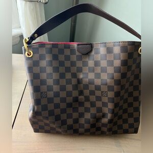 Brown and black shoulder bag. Delightful.